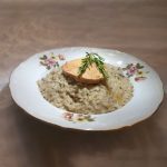 Mushroom risotto with whole half cooked duck liver
